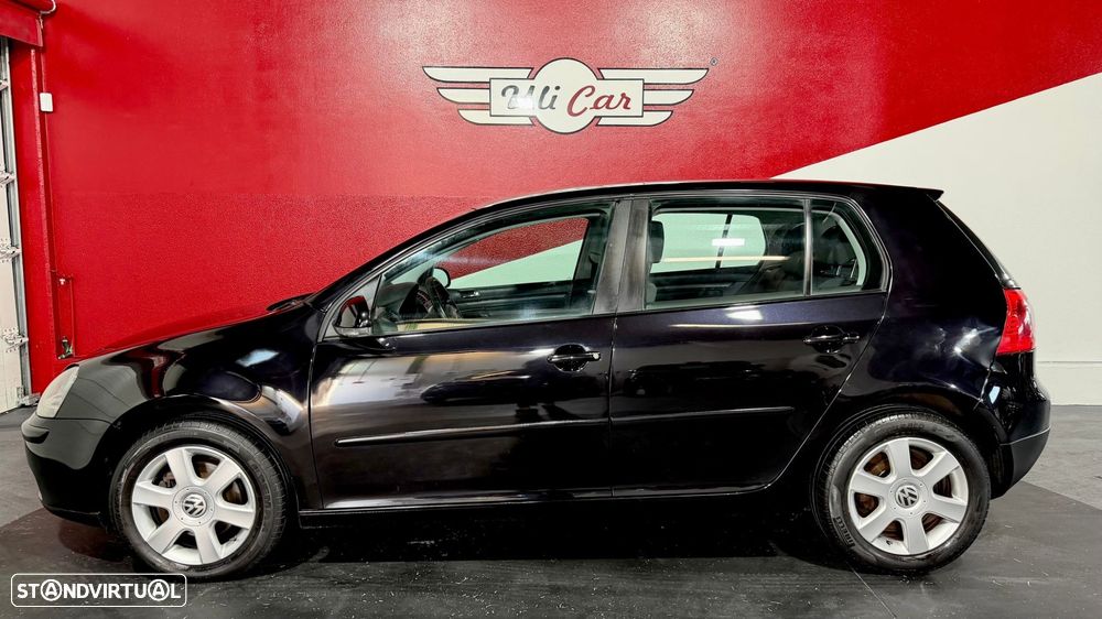 VW Golf 1.4i Confortline JE+AC - 11