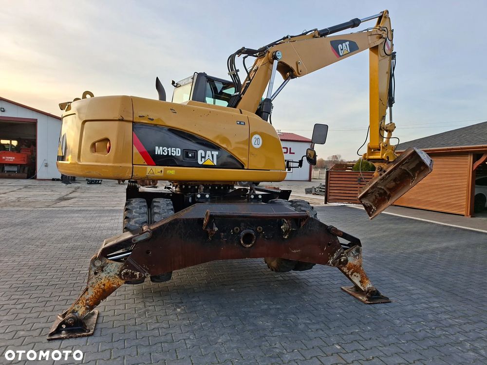 Caterpillar CAT M315D Rok 2011 - 13