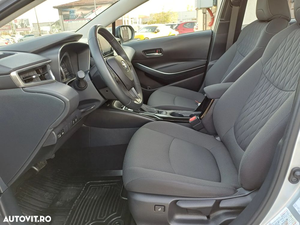 Toyota Corolla 1.8 HSD Business - 11