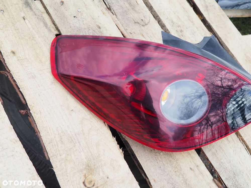 Lampa tył tylna lewa Opel Corsa D 3D 13242813 - 2