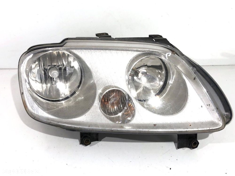 REFLEKTOR PRAWY PRZÓD  VW CADDY III Nadwozie pełne/minivan (2KA, 2KH, 2CA, 2CH) 2004 - 2015 2.0 - 1