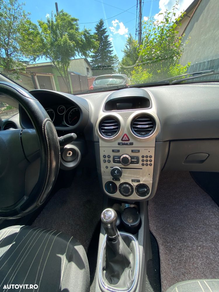 Opel Corsa 1.2i Enjoy - 11