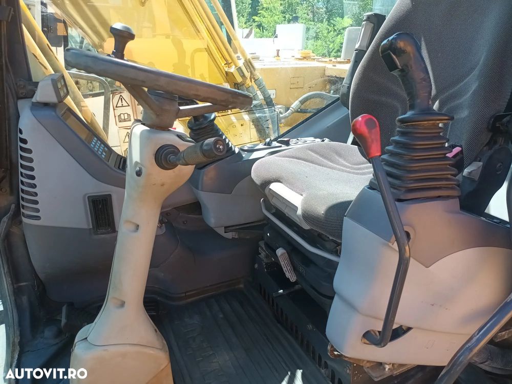 Komatsu PW130-7K - 10