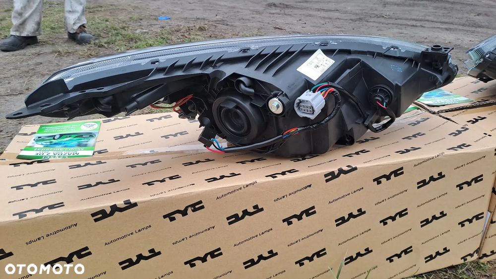 Reflektor Mazda 2 DE 2007-2014 NOWY - 7