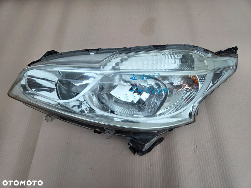 Lampa przednia lewa Peugeot 208 przed LIFT  9802221880 - 1