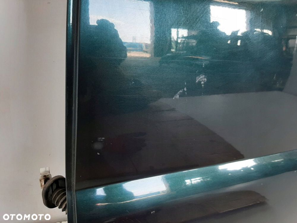 KIA SPORTAGE 2 II LIFT 09R DRZWI LEWY TYL KOD E2 - 10