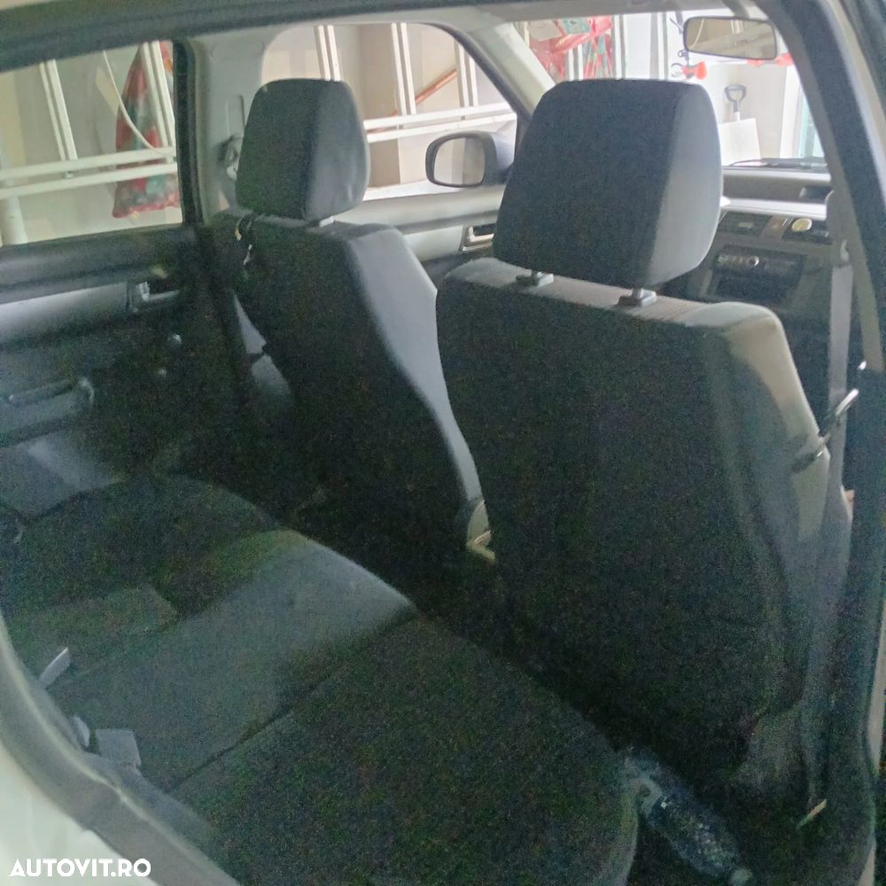 Suzuki Swift 1.3 Club - 4