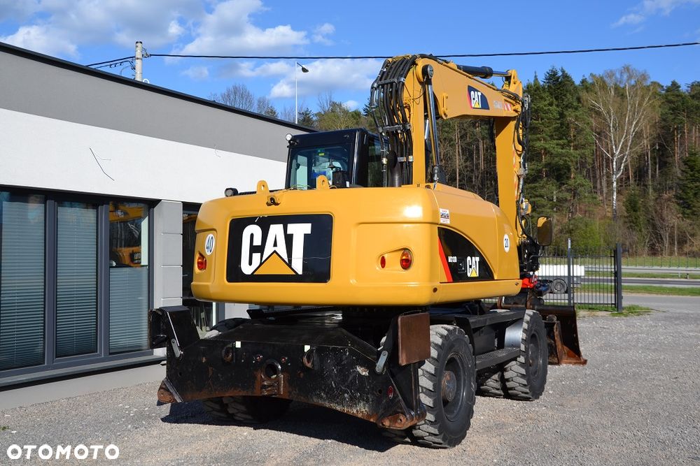 Caterpillar M 313 D, ROTOTILT - 9