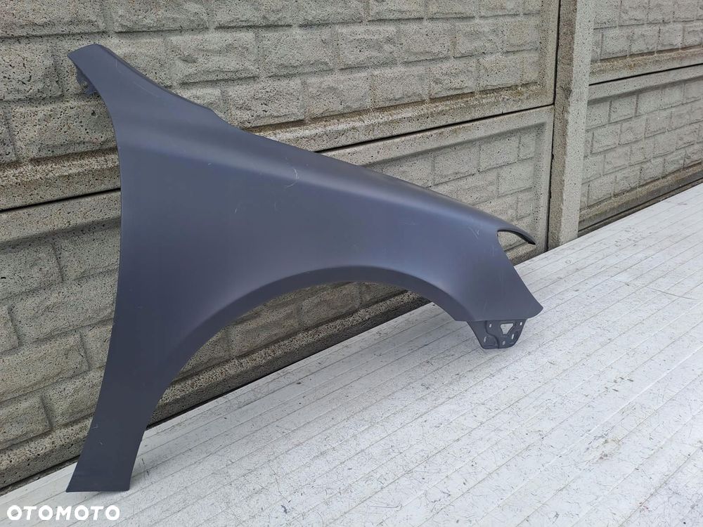 skoda octavia ii 2 lift 08-13 błotnik prawy przód oryginał - 3