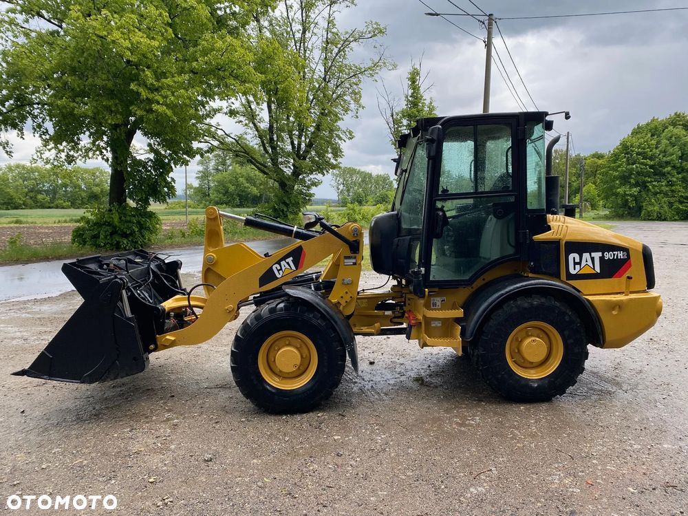 Caterpillar CAT 907H2, 2014 ROK, 6000 MTH, ŁYŻKA OTWIERANA + WIDŁY, z NIEMIEC, SUPER STAN, - 8