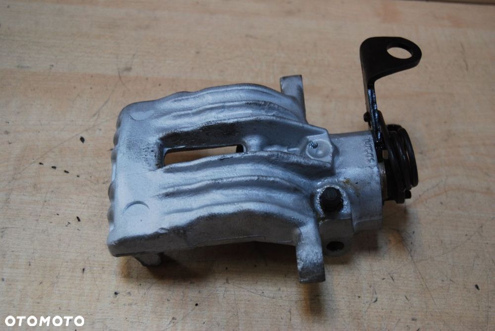 ZACISK LEWY TYŁ LUCAS 32325962 SEAT LEON I AUDI A3 REGENROWANY - 3