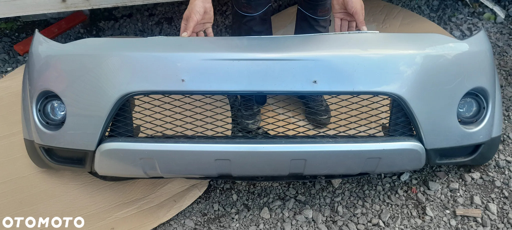 MITSUBISHI OUTLANDER II ZDERZAK PRZEDNI A31 - 2