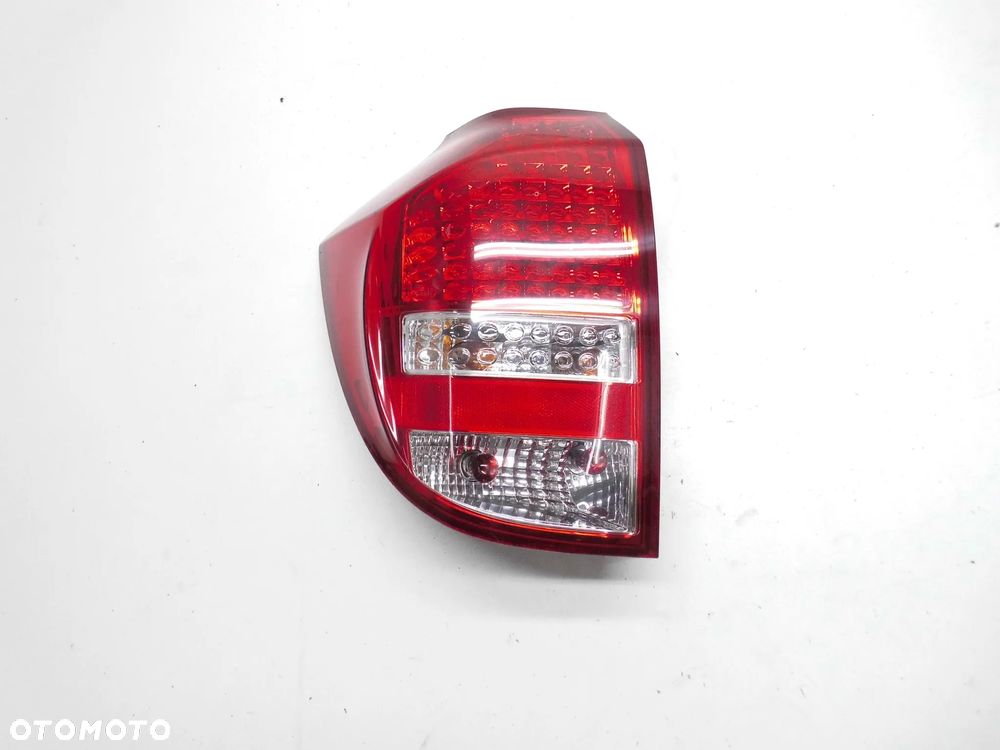 LAMPA KIA CEED I LIFT KOMBI LEWA TYLNA ORYGINAŁ - 1