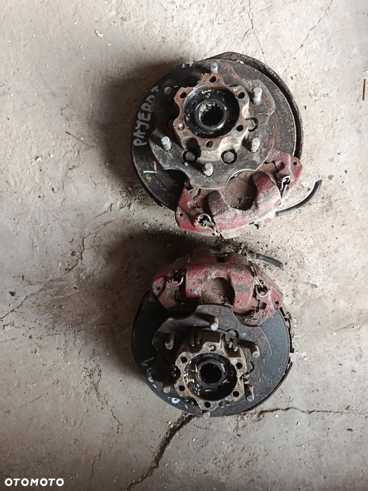 Zwrotnica przód prawa lewa zacisk hamulcowy Pajero 1 - 1