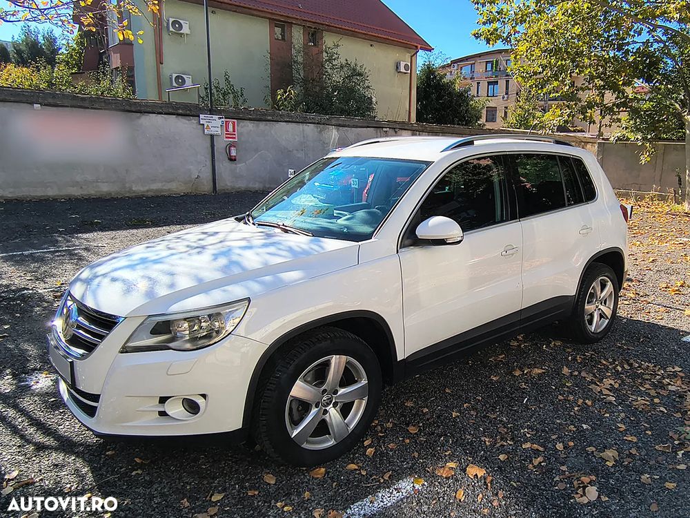 Volkswagen Tiguan 1.4 TSI 4Motion Trend&Fun - 1