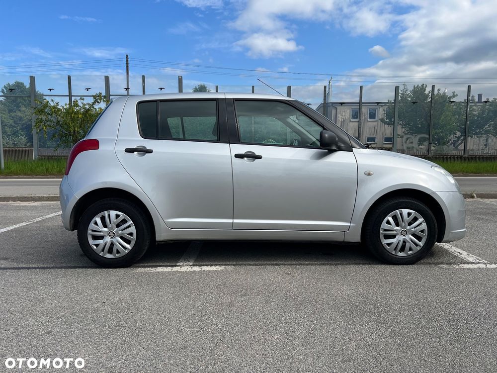 Suzuki Swift 1.3 Club - 11
