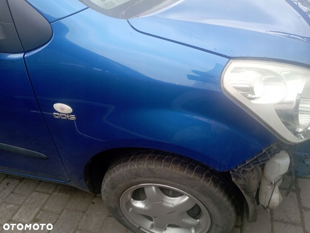 SUZUKI SPLASH BŁOTNIK PRAWY PRZÓD PRZEDNI - 1