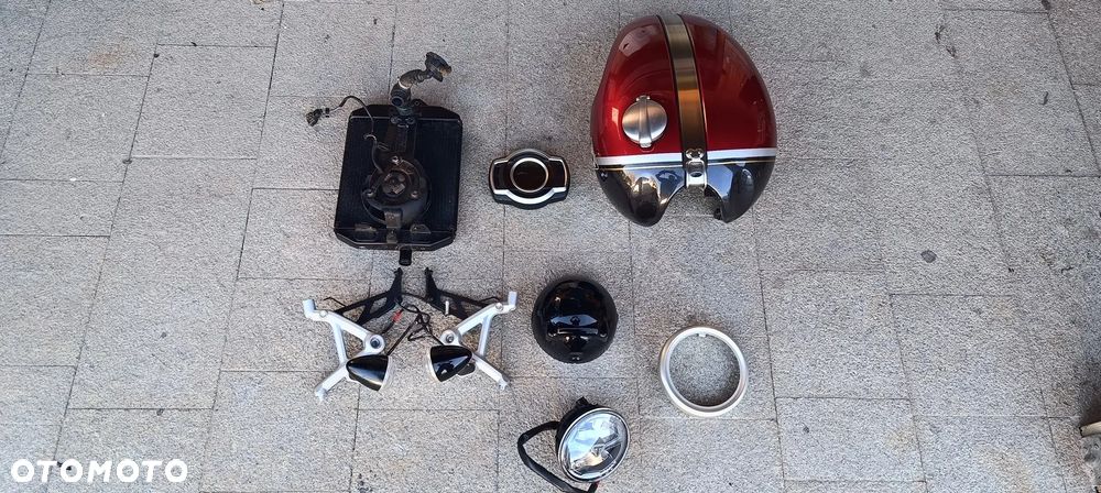 TRIUMPH SCRAMBLER 1200 LAMPA REFLEKTOR LICZNIK ZEGARY STELAŻ UCHWYTY KIERUNKOWSKAZ CHŁODNICA BAK ZBIORNIK