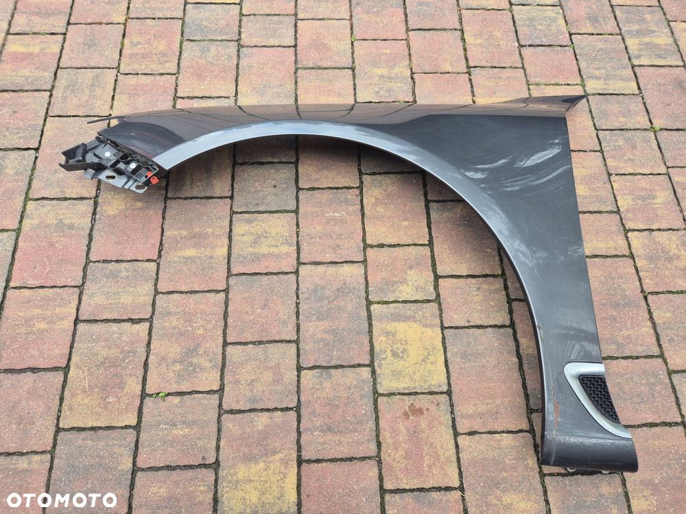 blotnik lewy przod saab 95 ng 10-12 - 1