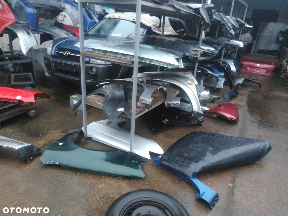 BŁOTNIK PRAWY PRZÓD KIA CERATO I PRZEDLIFT S5 - 1