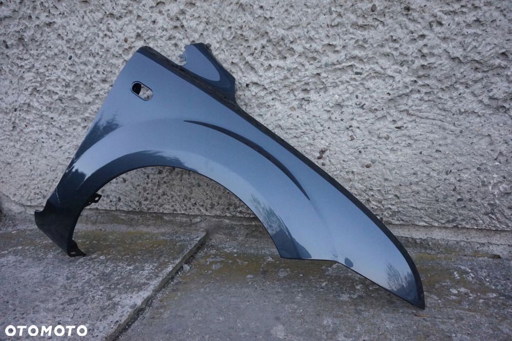 BŁOTNIK PRAWY FOCUS II MK2 04/08r H4 - 4