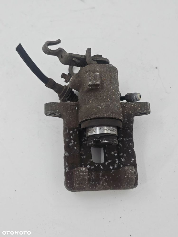 ORYGINALNY ZACISK HAMULCOWY LEWY TYŁ VW GOLF V 1K1 1K0615423 - 2