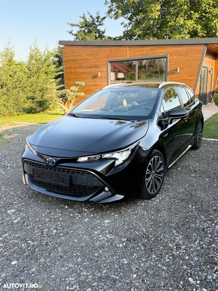 Toyota Corolla 1.8 HSD Business - 12