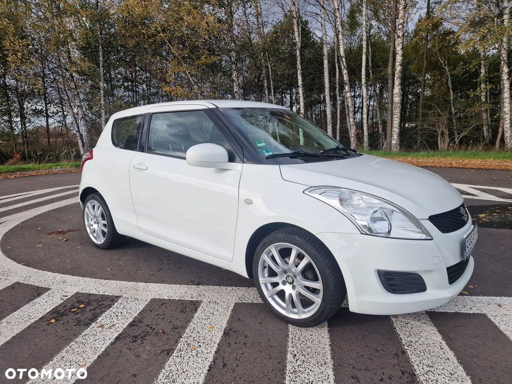 Suzuki Swift 1.2 Club - 11