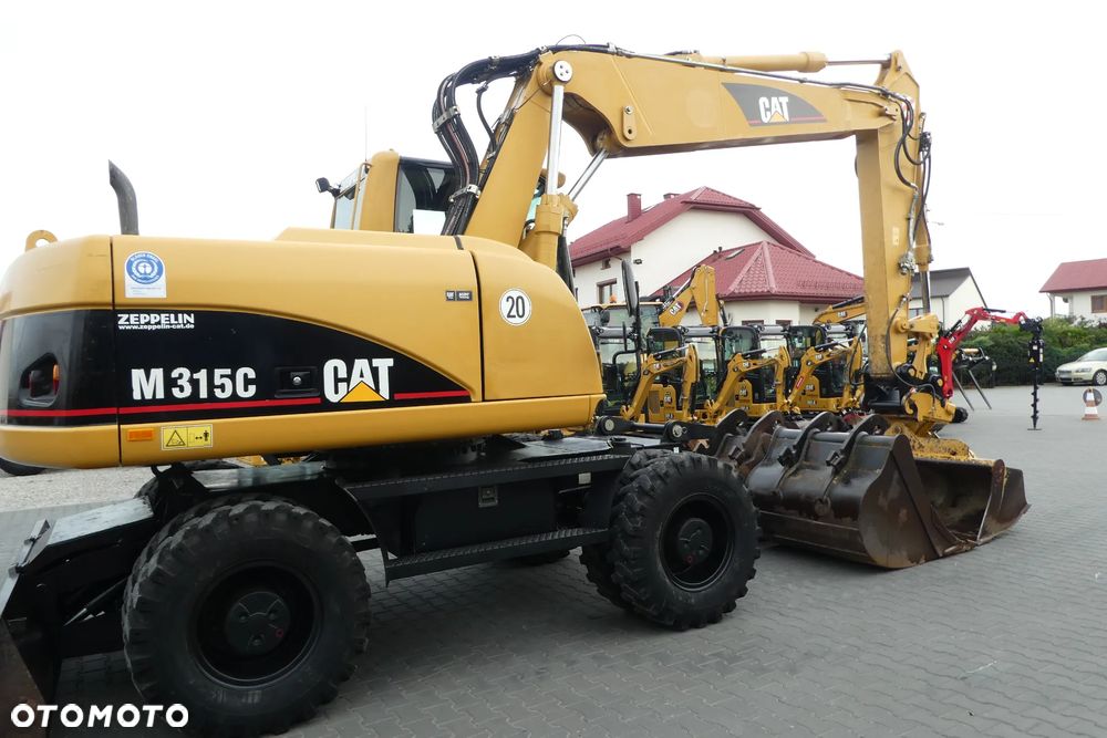 Caterpillar M315C Z NIEMIEC TRZY ŁYZKI - 6