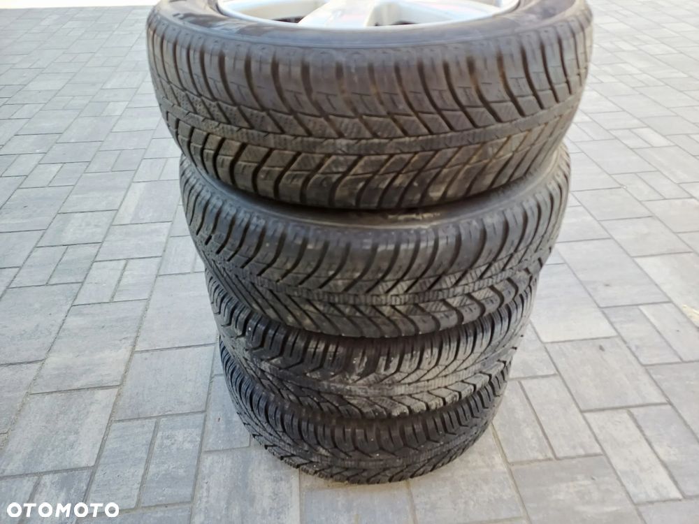 FELGI Z OPONAMI KOŁA ALUMINIOWE VW GOLF V R15 5X112 ET48 57,1 mm OPONY NEXEN R15 195/65 WIELOSEZON NR11 - 16