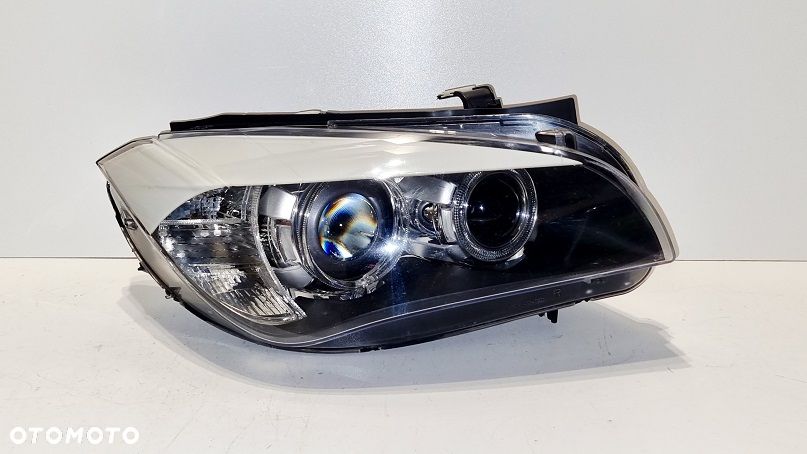 REFLEKTOR PRAWY XENON BMW X1 E84 EUROPA - 1