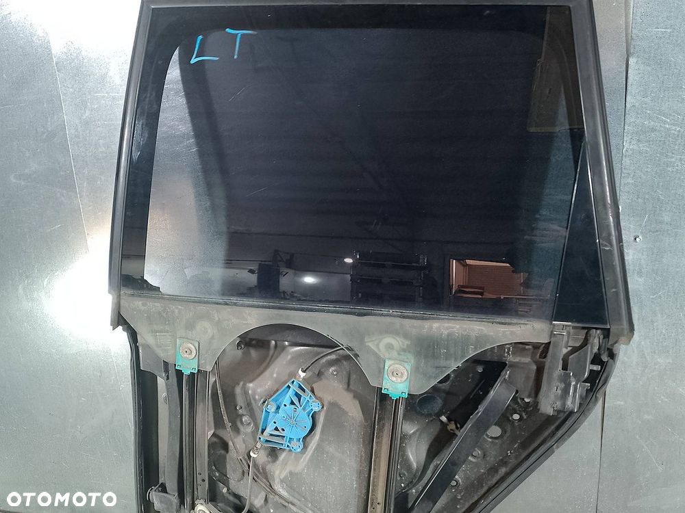 PODNOŚNIK SZYBY LEWY TYŁ Z STELAŻEM VW TOUAREG I    7L6839729A - 1