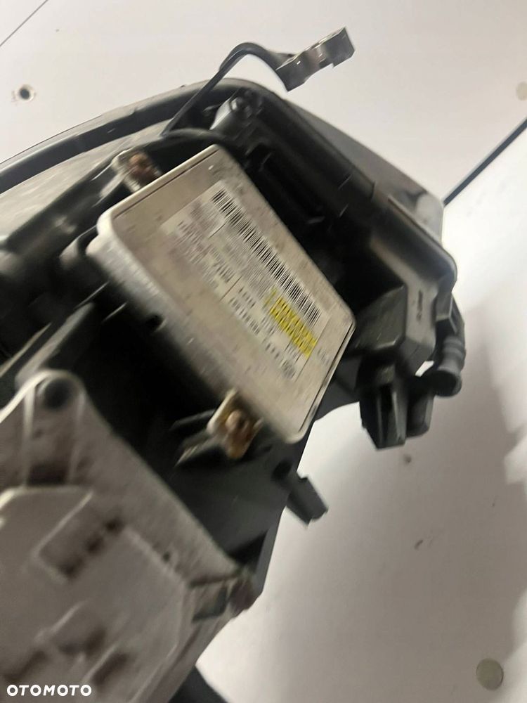 307 023 427 Reflektor Audi A6 S6 C6 4F PRZÓD LEWY - 10