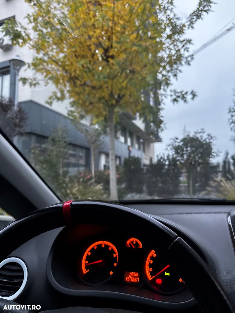 Opel Corsa 1.4i Cosmo - 11