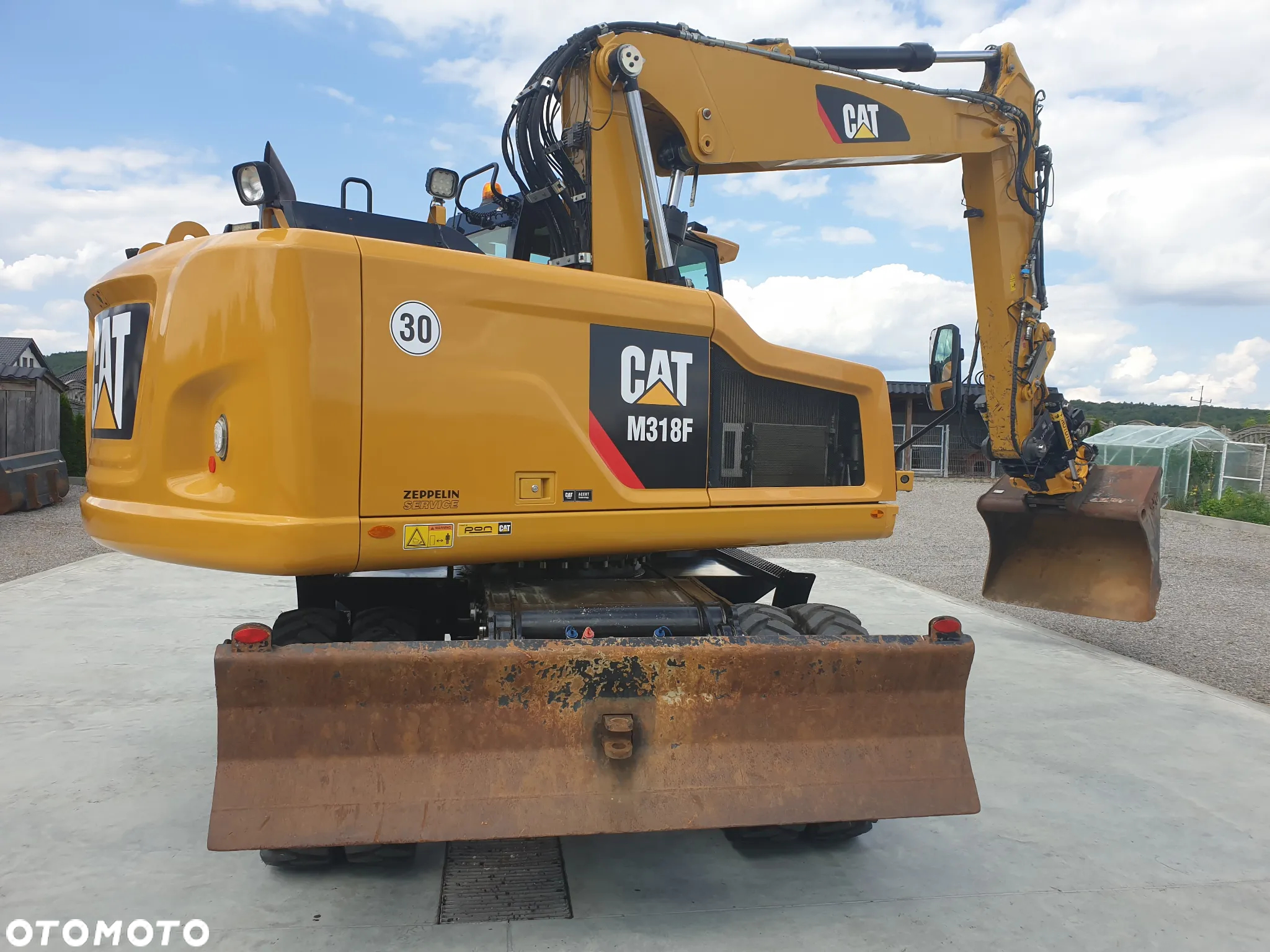 Caterpillar M 318 F ROTOTILT SPROWADZONY ŁADNY STAN - 36