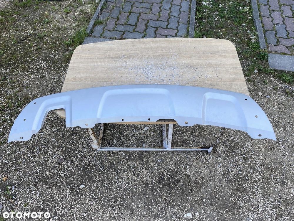 SPOILER LISTWA DOKŁADKA ZDERZAKA TYLNEGO DACIA DUSTER 850706169R NIEZAKŁADANA - 1