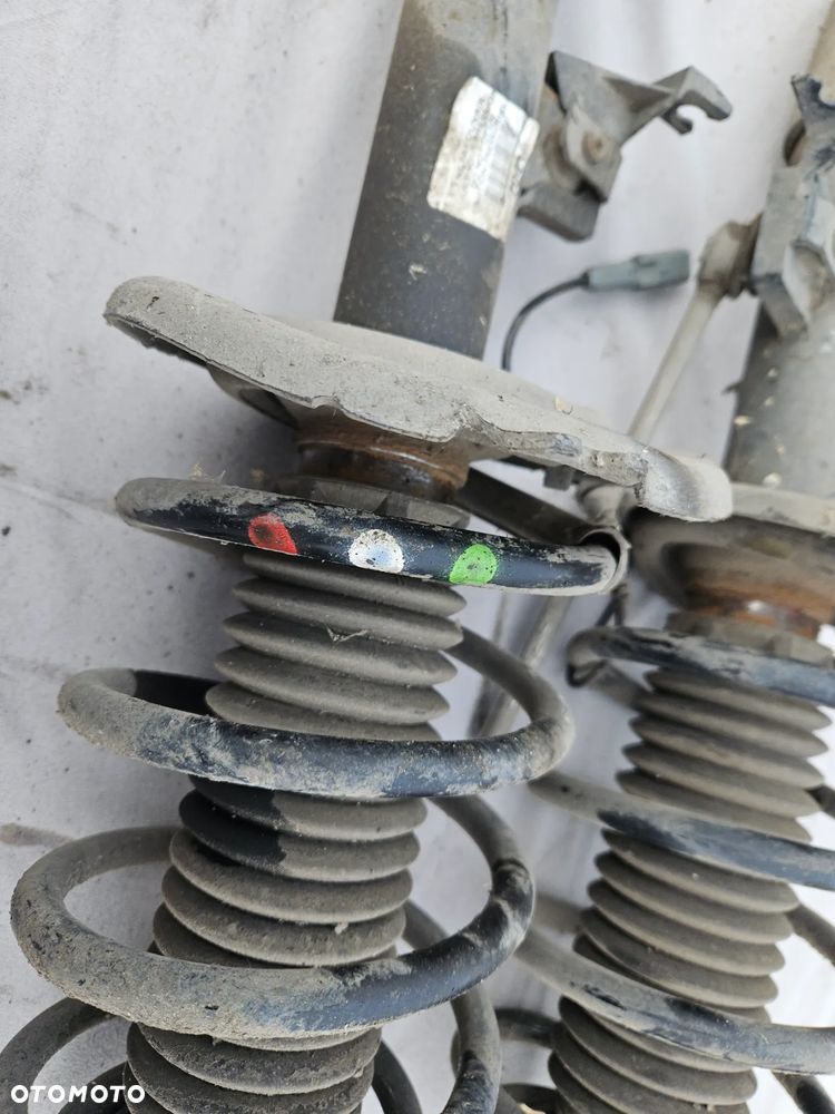 Amortyzator sprezyna McPherson lewy przód Peugeot 3008 I 1,6 THP 2011r 70 tys. km 7043 - 3