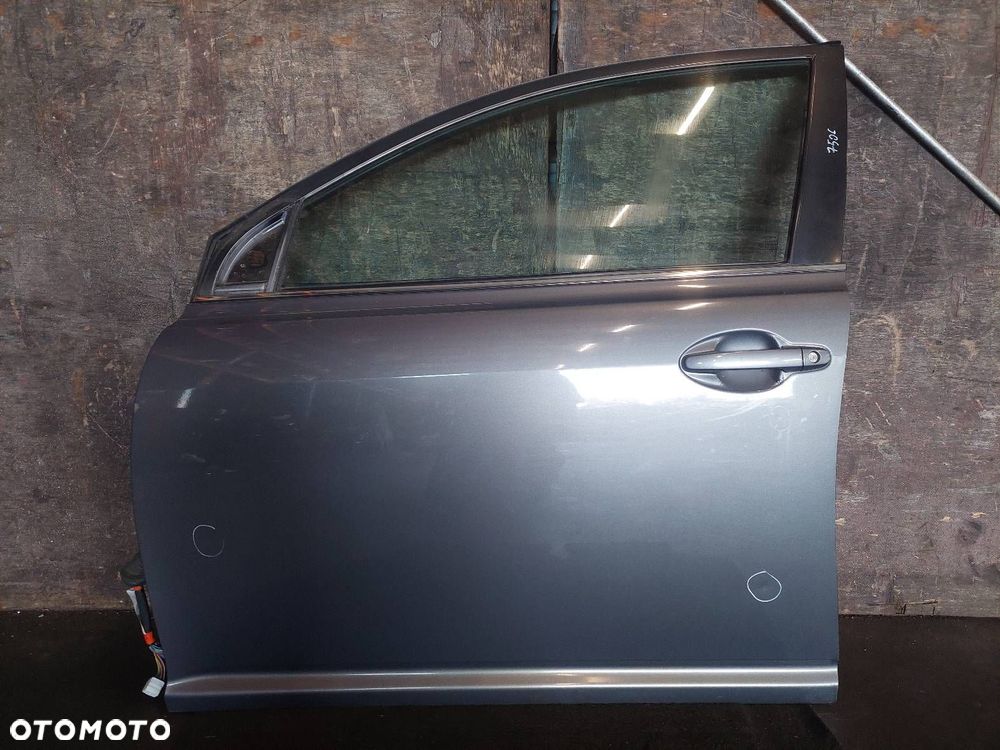DRZWI KOMPLETNE LEWY PRZÓD TOYOTA AVENSIS T25 1E5 - 1