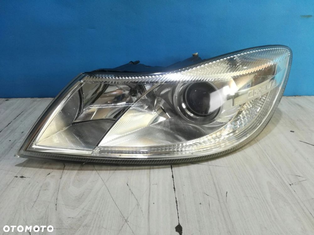 Skoda Octavia II 1Z Lift lampa reflektor lewa przód Europa 08/12 - 2
