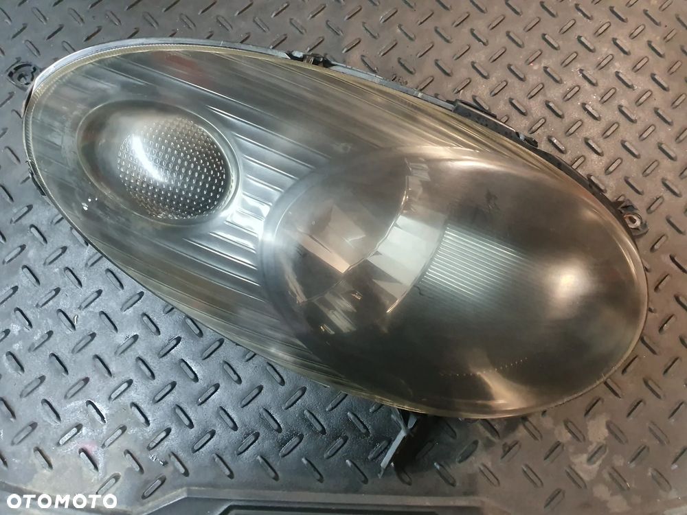 Nissan Micra K12 03-10 LAMPA PRZEDNIA PRZÓD PRAWA OE 26010AX705 EUROPA    89007480 - 1