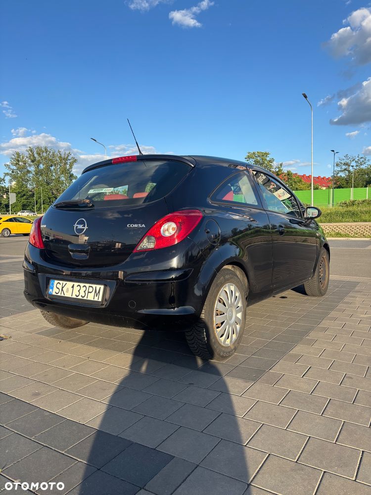 Opel Corsa 1.4 16V Cosmo - 7