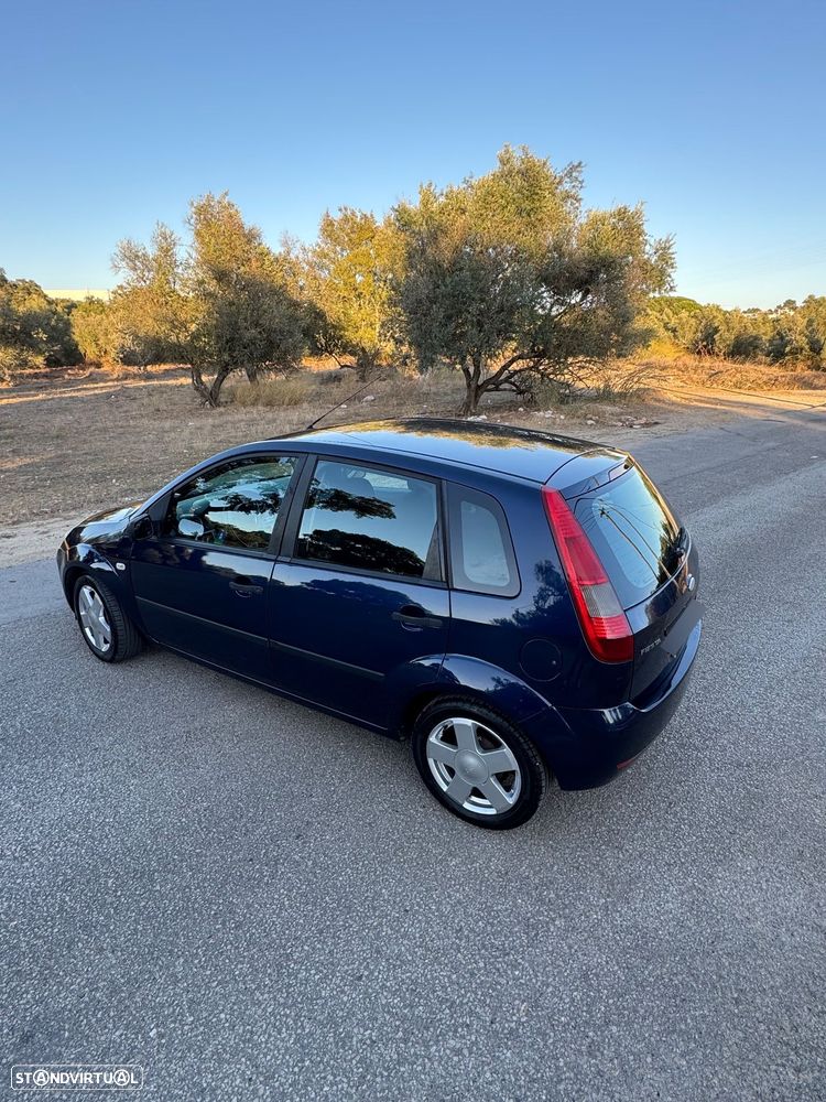 Ford Fiesta 1.25 Ghia - 21