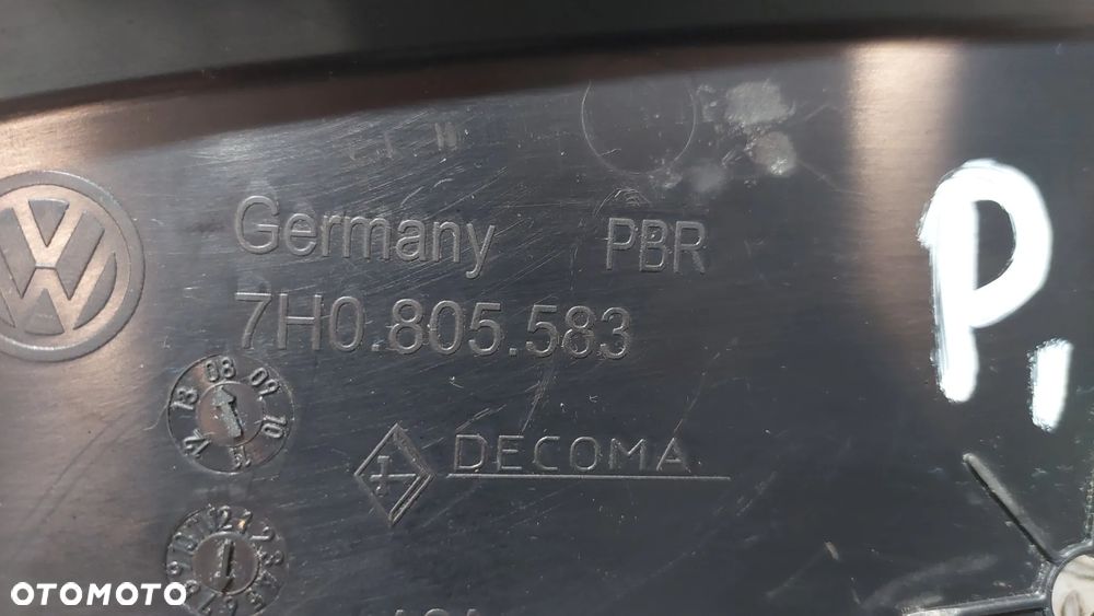 OSŁONA LAMPY PRAWY PRZÓD VW T5 R2008 NR 7H0805583 - 2