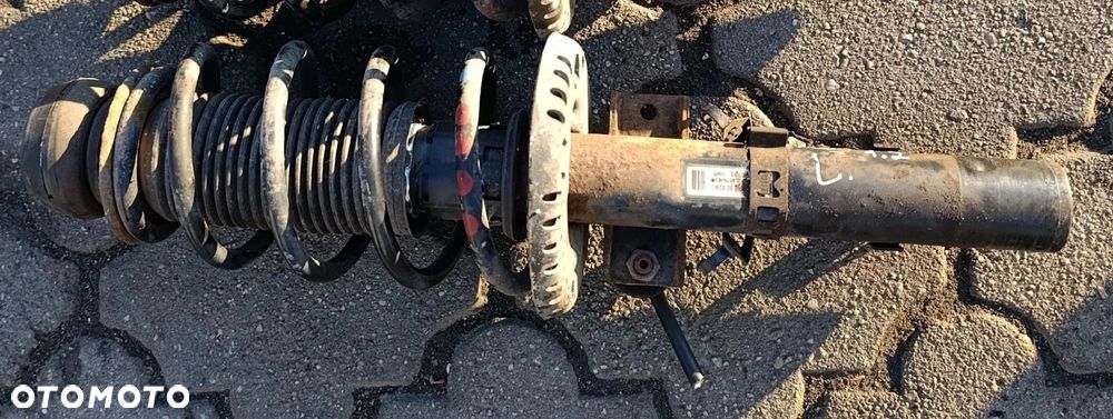 Roomster amortyzator przedni przód LEWY 1,2 12V Fabia II Yeti Skoda - 1