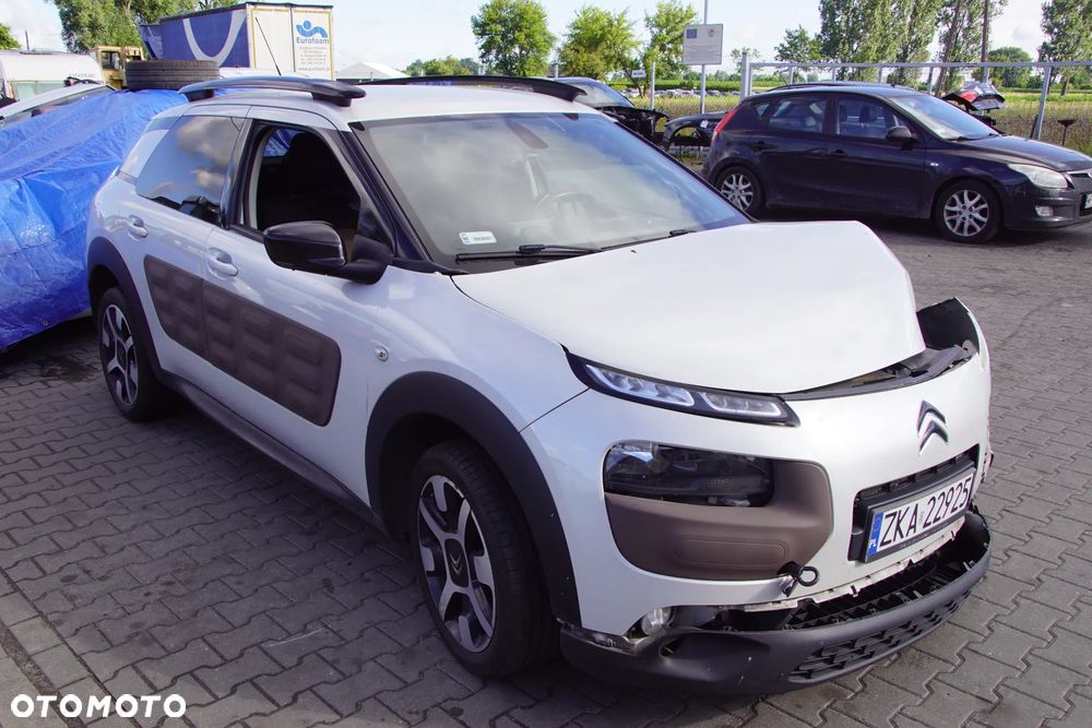 Auto na części - Citroen C4 Cactus 1.2 PureTech 110 KM HNZ 20ET25 EFC 2015R Silnik Skrzynia Drzwi Błotnik Zderzak Klapa Lampa Lusterko Klamka Szyba Deska Kokpit Sterownik Moduł Czujnik Licznik Wyświetlacz Panel Kierownica - 10