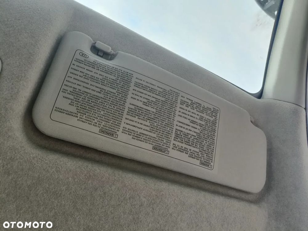 DAIHATU SIRION II 04-10 r. DASZEK lewy osłona przeciwsłoneczna lewa ** - 2