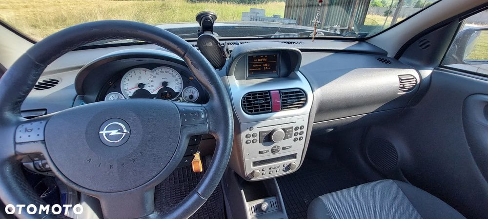 Opel Corsa 1.2 16V Enjoy - 11