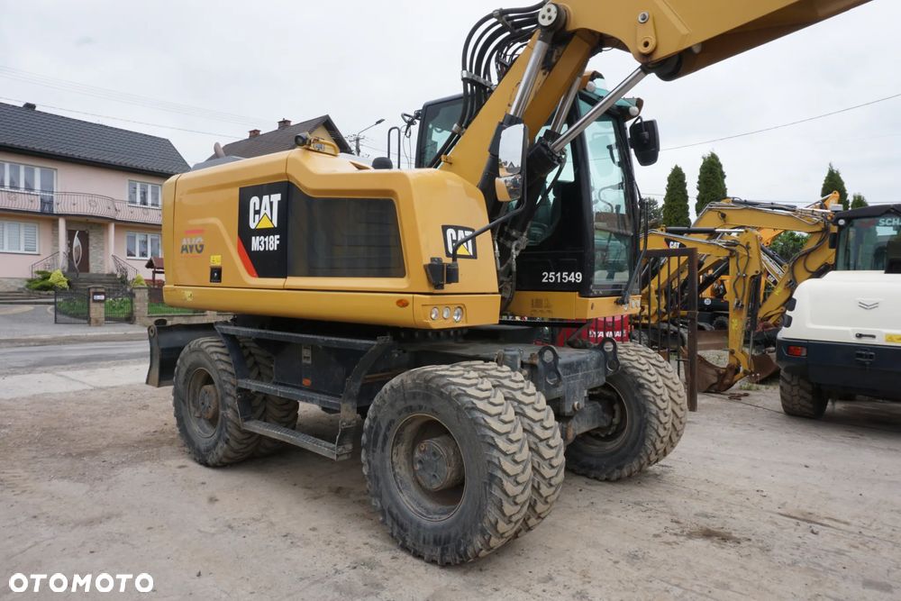 Caterpillar M 318 F - 4