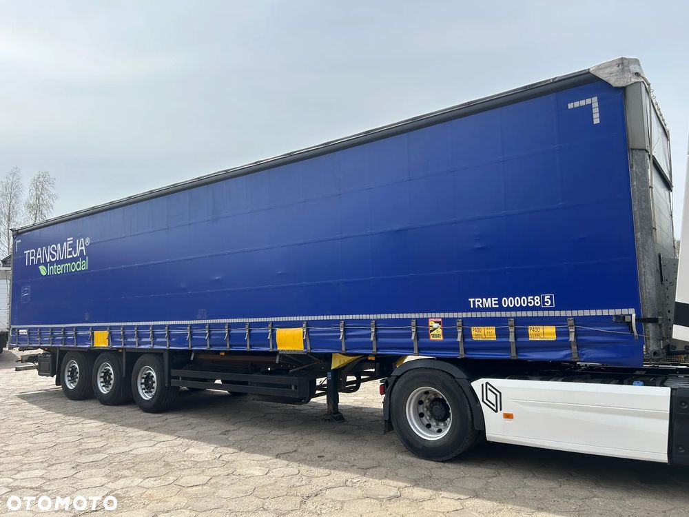 Schmitz Cargobull FIRANKA PODNOSZONY DACH NOWE PLANDEKI / 657 841 KM PRZEBIEGU / BARDZO ŁADNE OPONY / Z PEŁNYM WYPOSAŻENIEM DO ZAŁADUNKU / UCHWYTY PROMOWE / DOSTĘPNE 20 SZTUK KOLORY SREBRNY - NIEBIESKI - CZERWONY !! - 20