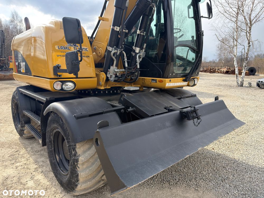 Caterpillar 313d - 12